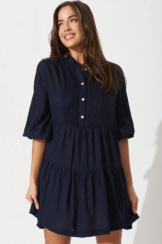 caracelle-smock-dress-in-navy-linen-blend