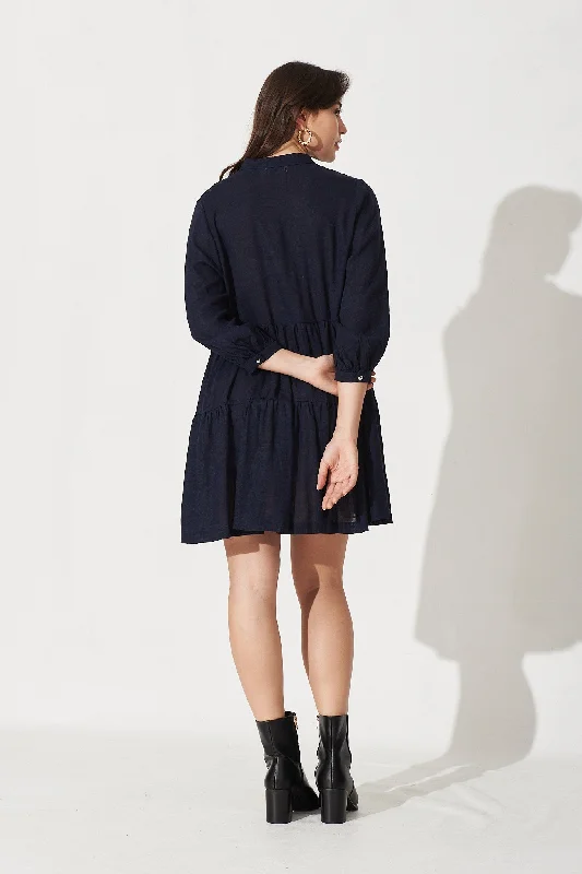 caracelle-smock-dress-in-navy-linen-blend