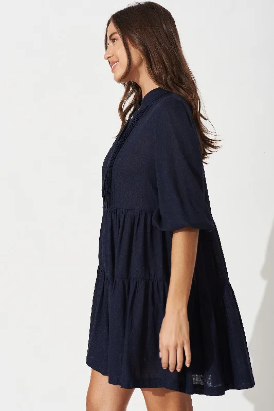 caracelle-smock-dress-in-navy-linen-blend