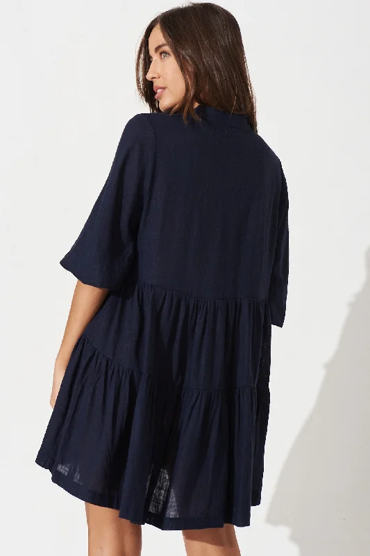 caracelle-smock-dress-in-navy-linen-blend