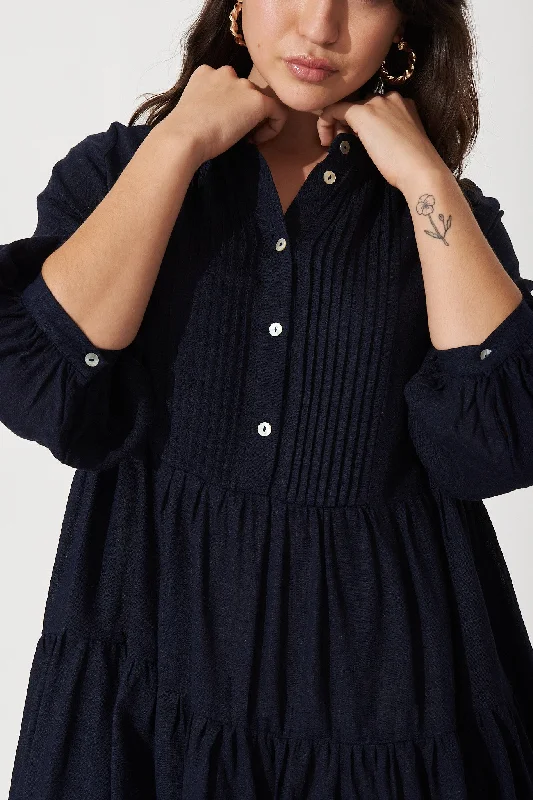 caracelle-smock-dress-in-navy-linen-blend