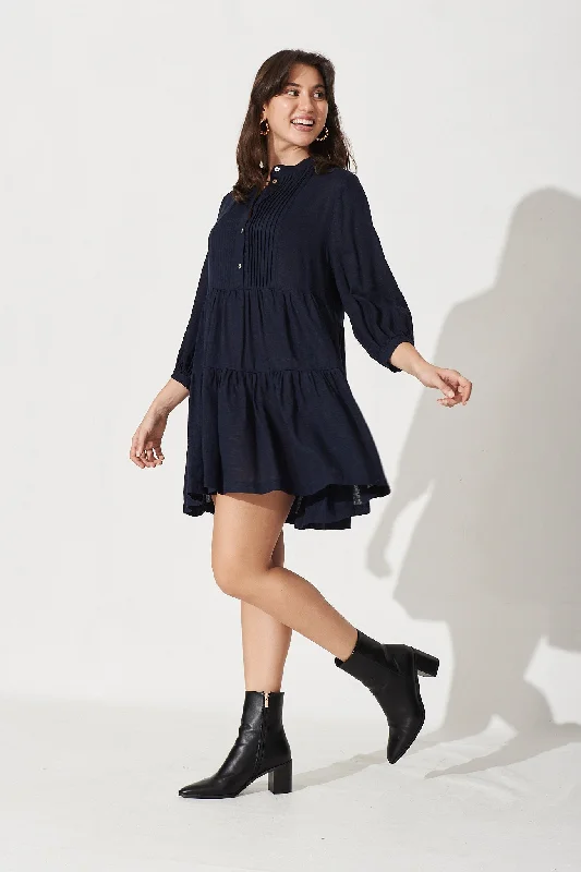 caracelle-smock-dress-in-navy-linen-blend