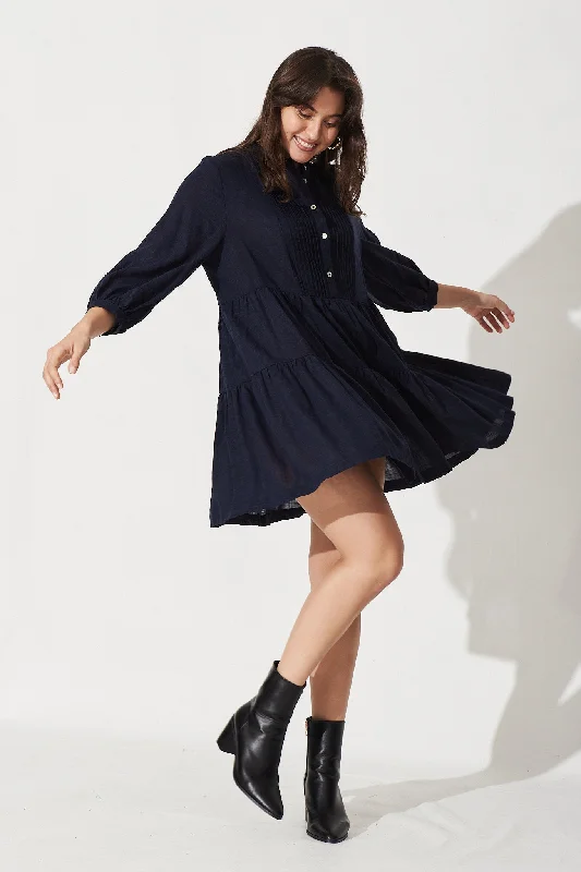 caracelle-smock-dress-in-navy-linen-blend