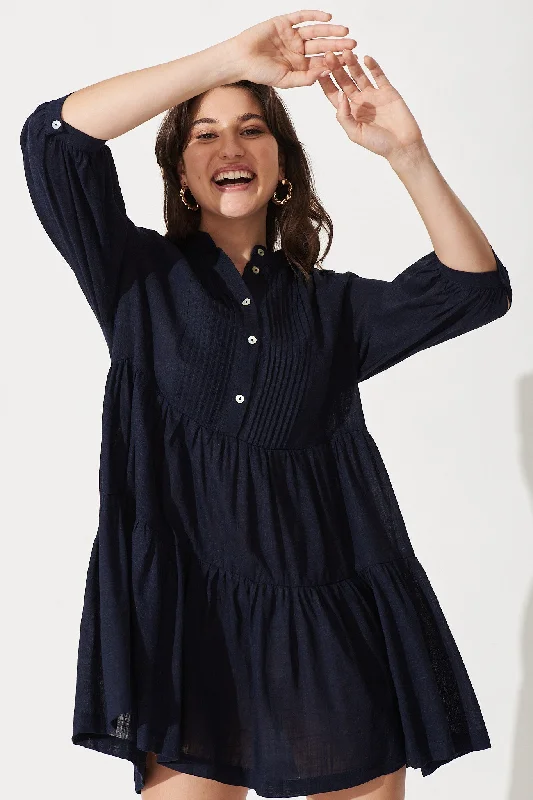 caracelle-smock-dress-in-navy-linen-blend