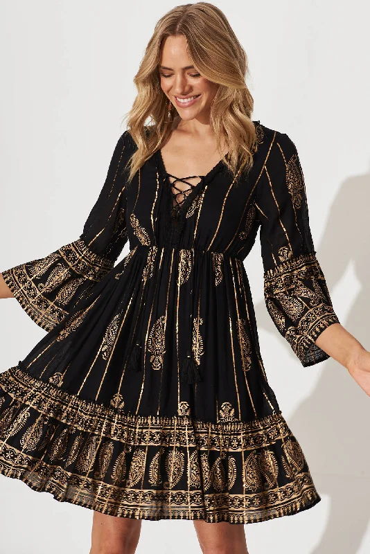 elliott-dress-in-black-with-gold-print