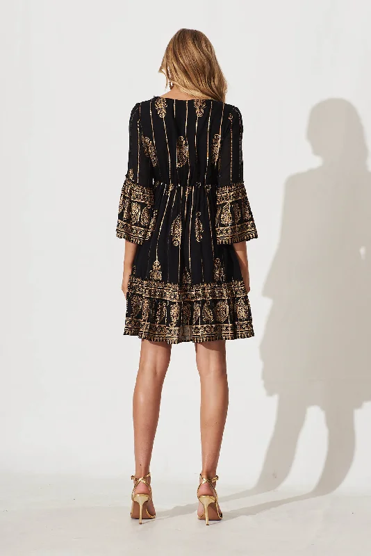 elliott-dress-in-black-with-gold-print