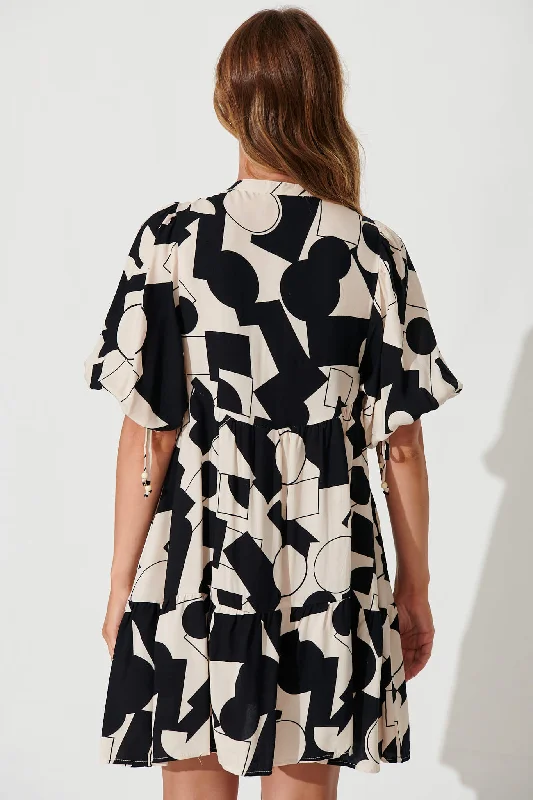 emelyn-smock-dress-in-cream-with-black-geometric-print