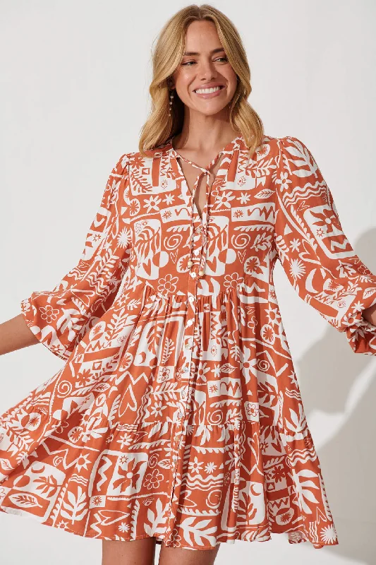 solana-smock-dress-in-rust-with-white-print