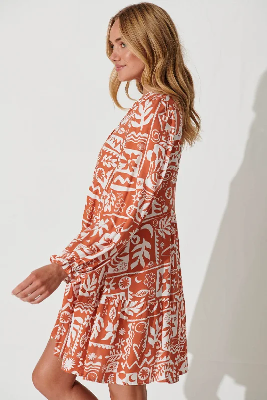 solana-smock-dress-in-rust-with-white-print