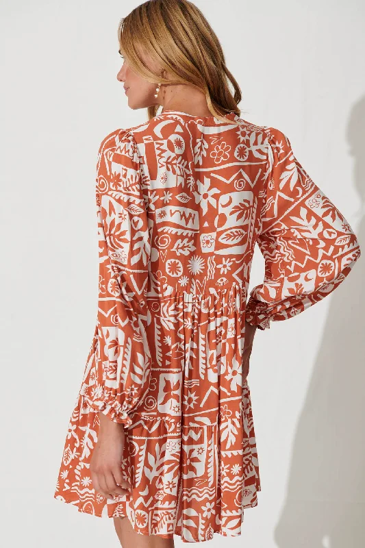 solana-smock-dress-in-rust-with-white-print