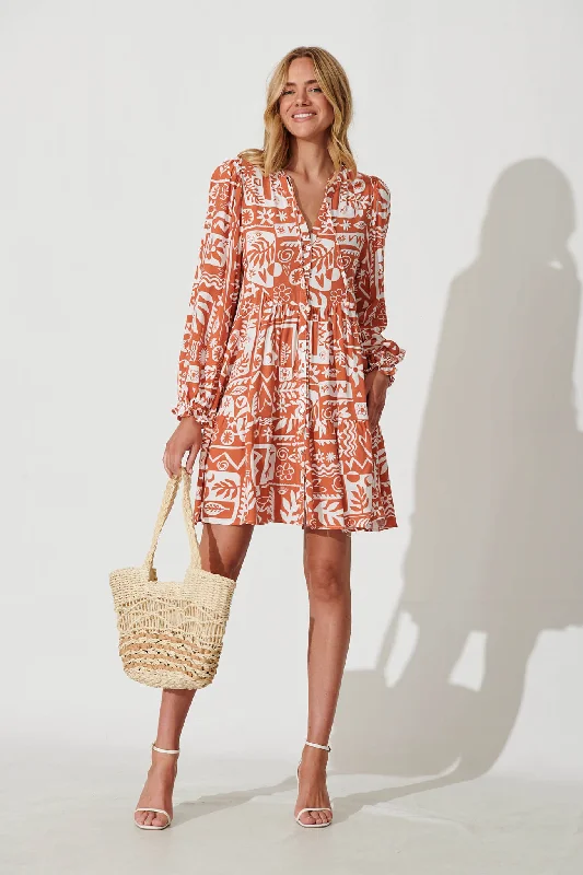 solana-smock-dress-in-rust-with-white-print