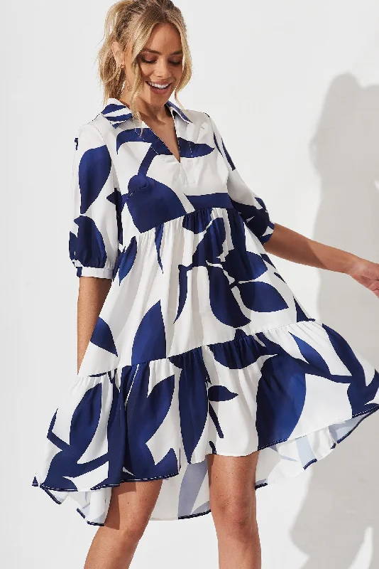 tamira-smock-dress-in-white-with-navy-print