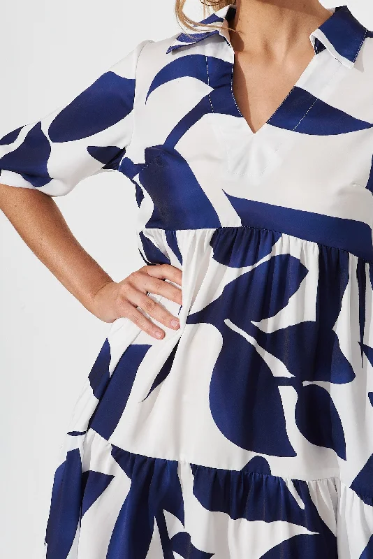 tamira-smock-dress-in-white-with-navy-print